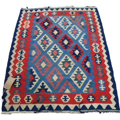 1789 - A small Kilim mat with alternating rows of diamonds on a pale blue ground, 130cm x 95cm approximatel... 