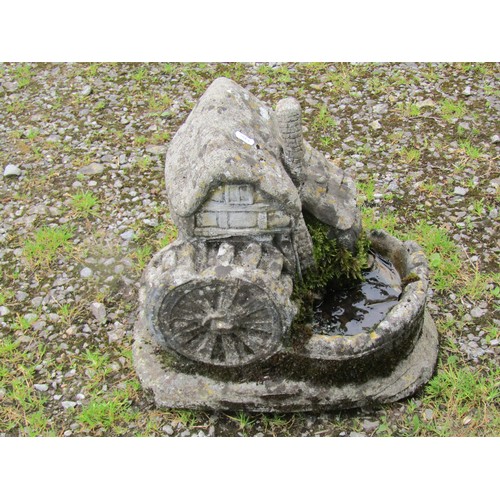 1057 - A weathered cast composition stone square tapered planter with raised relief detail, 34 cm square to... 