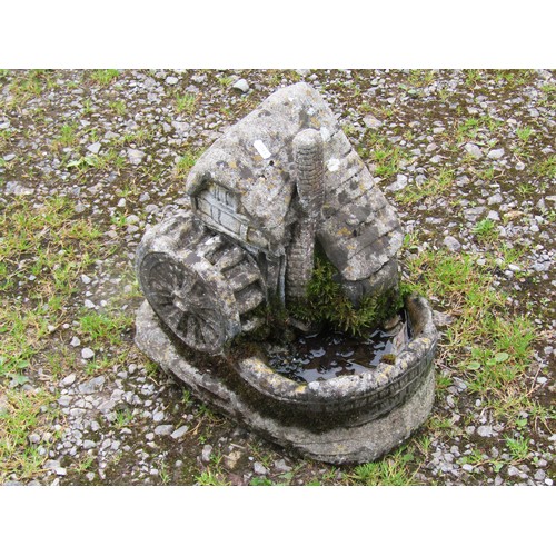 1057 - A weathered cast composition stone square tapered planter with raised relief detail, 34 cm square to... 