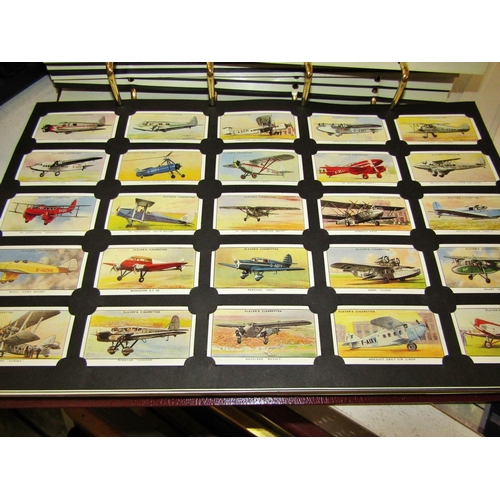 739 - A large album of cigarette cards together with three smaller antiquarian collections (engine spotter... 