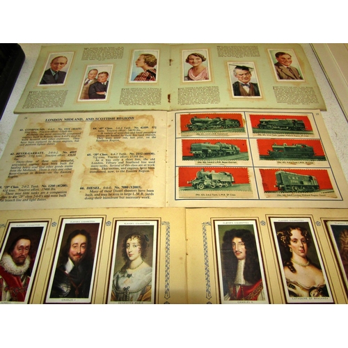 739 - A large album of cigarette cards together with three smaller antiquarian collections (engine spotter... 