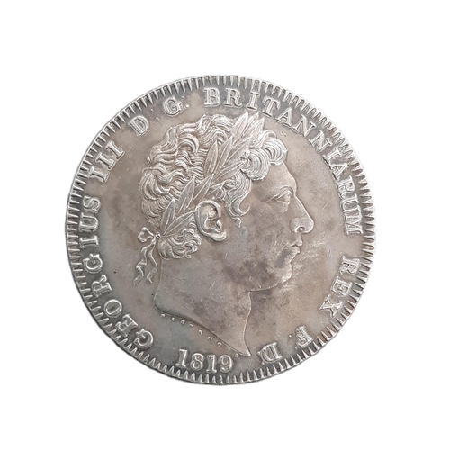 877 - George IV (1820 - 1830) A silver crown coin, 1819 edge LIX.