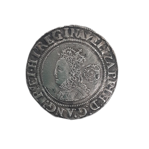 875 - Elizabeth I (1558 - 1603) A silver 6d coin, 1561, mm. Pheon.