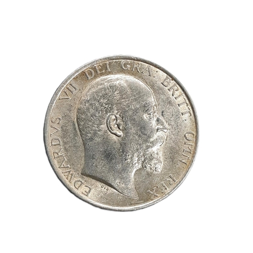 920 - Edward VII (1901 - 1910) A silver shilling coin, 1904, (scarce).