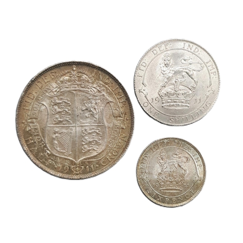 933 - George V (1910 - 1936) A silver half crown, shilling and 6d coins, 1911 (3).