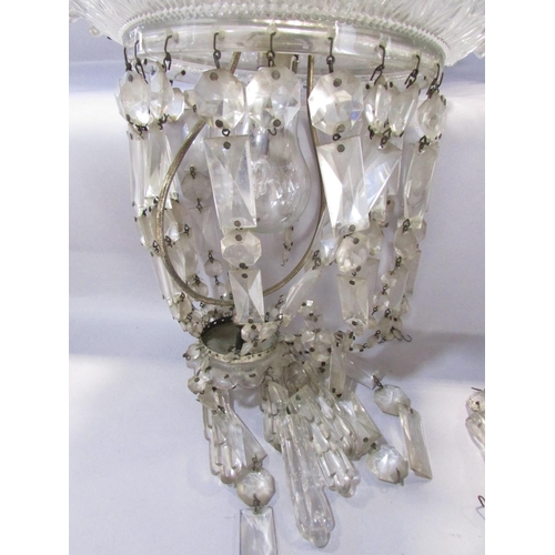 512 - A Murano glass chandelier with a crimped crown hung with facetted crystal drops, together with a gla... 