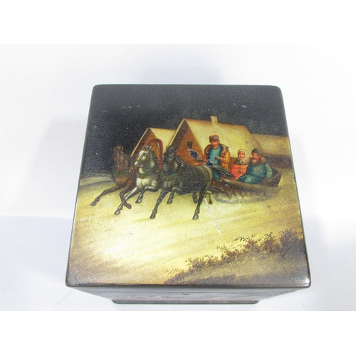 520 - A Russian lacquered tea caddy with painted Troika Scenes to the four sides and lid (unsigned) togeth... 