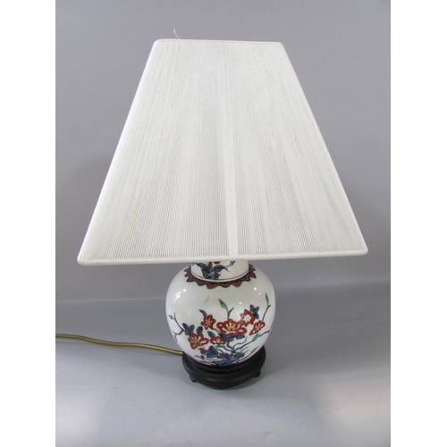 529 - A modern blue and white Chines style ginger jar lamp, another white and floral similar lamp, a Europ... 