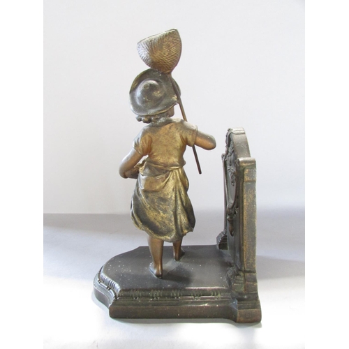 534 - A pair of painted spelter bookends one with boy and the other a girl 15cm wide.