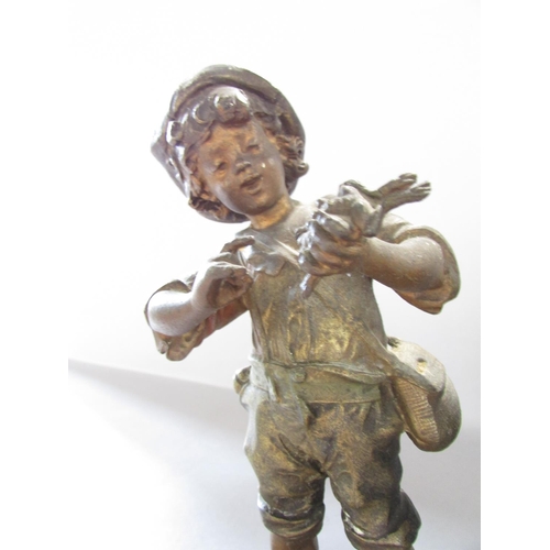 534 - A pair of painted spelter bookends one with boy and the other a girl 15cm wide.