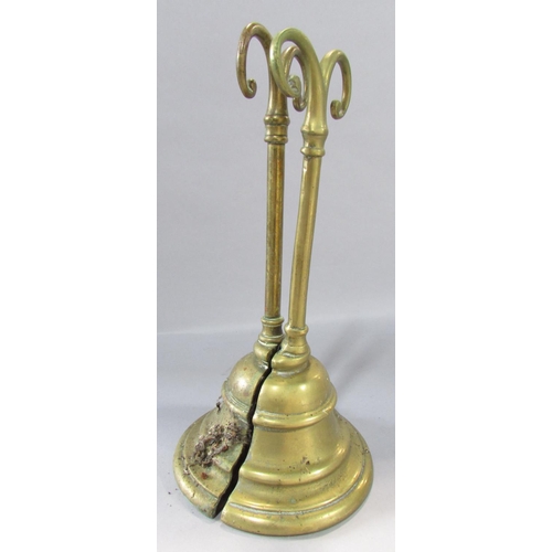 538 - A pair of 19th century brass door stops weighted with cast iron, 24.5 cm high