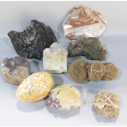 549 - A collection of mineral samples including rose sand crystal, clear quartz clusters, amethyst quartz ... 