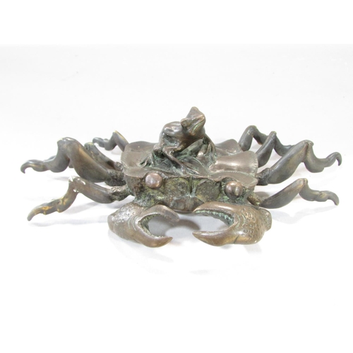 552 - A late 19th or early 20th century Japanese bronze crab with a frog on its back, 18cm wide x 10cm, to... 