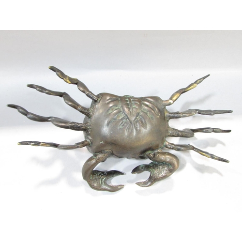 552 - A late 19th or early 20th century Japanese bronze crab with a frog on its back, 18cm wide x 10cm, to... 