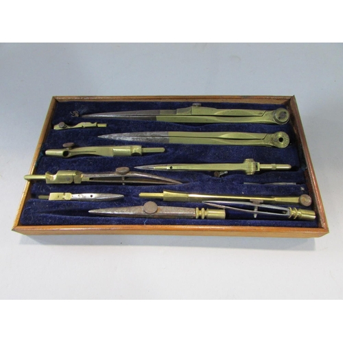 555 - A vintage H Osborn geometry set of dividers, a wood case with five types of pliers, and a B & S righ... 