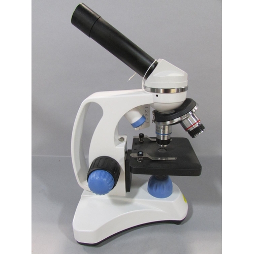 567 - A Swift Model SW150 Triple Revolving Microscope with upper and lower illumination, in near new condi... 