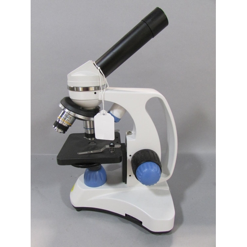 567 - A Swift Model SW150 Triple Revolving Microscope with upper and lower illumination, in near new condi... 