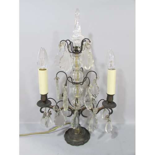 574 - A pair of converted cut glass and bronze candelabra  with a central column of glass baubles hung wit... 