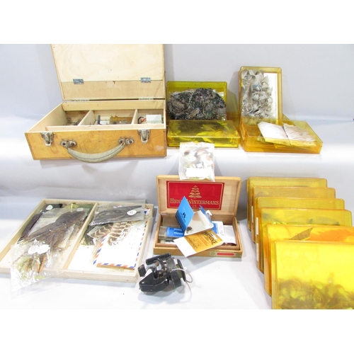 584 - A Fly Fisherman’s Tying Box with a small clamp, tweezers, file, a selection of different coloured co... 