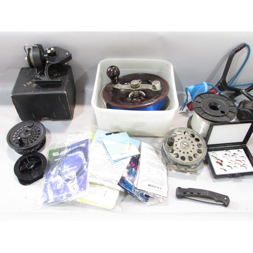 585 - Fishing equipment including an Alvey deep sea 300 yard fishing reel, an Intrepid Deluxe reel, togeth... 