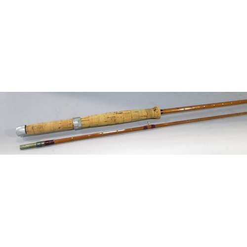 588 - A Vintage Hardy’s G G H Triumph 2 piece split cane fishing rod 260cm long approximately.