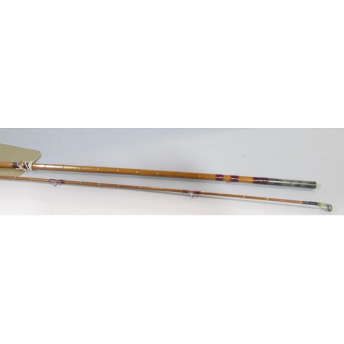 588 - A Vintage Hardy’s G G H Triumph 2 piece split cane fishing rod 260cm long approximately.