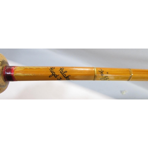 588 - A Vintage Hardy’s G G H Triumph 2 piece split cane fishing rod 260cm long approximately.