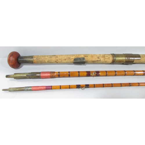 588 - A Vintage Hardy’s G G H Triumph 2 piece split cane fishing rod 260cm long approximately.