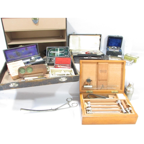 593 - A Collection of vintage Doctor’s surgical effects including a suturing kit, a uretherscope, a Doctor... 