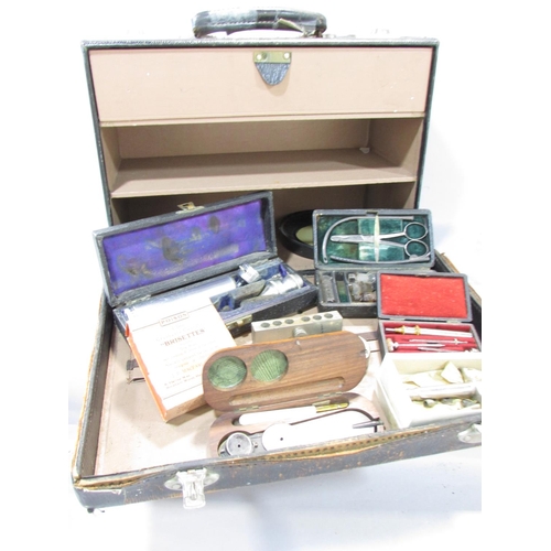 593 - A Collection of vintage Doctor’s surgical effects including a suturing kit, a uretherscope, a Doctor... 