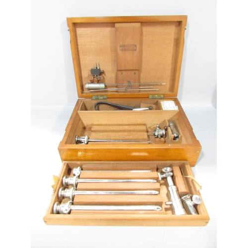 593 - A Collection of vintage Doctor’s surgical effects including a suturing kit, a uretherscope, a Doctor... 