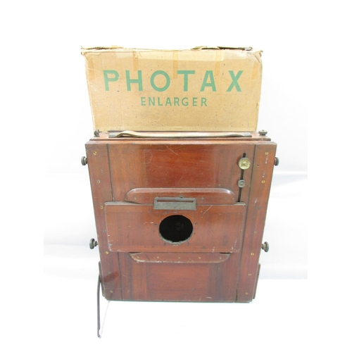 597 - A Vintage “Photax” mahogany photo enlarger with its original packaging.