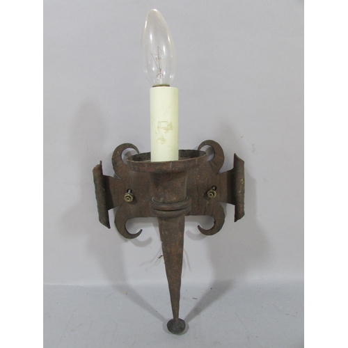 603 - Six Chateauesque wrought iron torch wall lights with scrolled back plates and two scrolled wall ligh... 