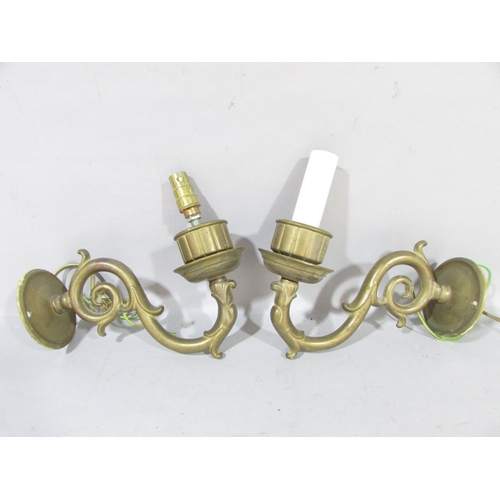 603 - Six Chateauesque wrought iron torch wall lights with scrolled back plates and two scrolled wall ligh... 