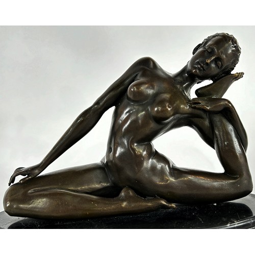 553 - A bronze nude yoga lady on an oval marble base, signed MILO to the right thigh, 21cm wide x 16cm hig... 