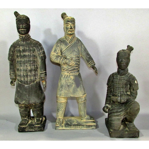 566 - Three Black Terracotta Soldiers, souvenirs from the tomb of Qin Shi Huang in Xian China.