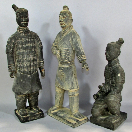 566 - Three Black Terracotta Soldiers, souvenirs from the tomb of Qin Shi Huang in Xian China.