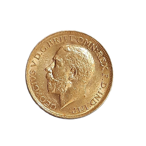 865 - George V (1910 - 1936) A gold full sovereign coin, 1916.