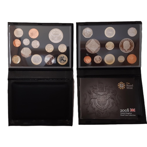 969 - Royal Mint, Delux annual proof coin sets in black leather holders, 2008 and 2010