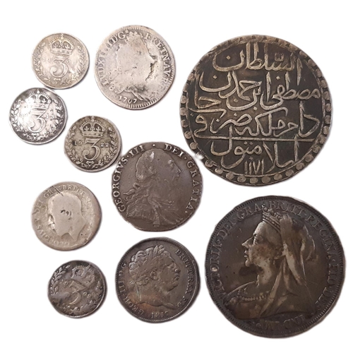 988 - A mixed collection of 18th century and later coinage to include a George III silver 6db coin, 1787, ... 