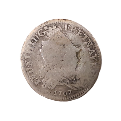 988 - A mixed collection of 18th century and later coinage to include a George III silver 6db coin, 1787, ... 