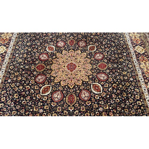 1752 - An Ardabil design carpet, with an all over floral pattern on a black ground, 360cm x 274cm approxima... 