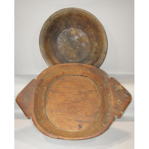 611 - Two Indian rice/grain bowls, both circular, one carrying handles.