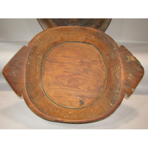 611 - Two Indian rice/grain bowls, both circular, one carrying handles.