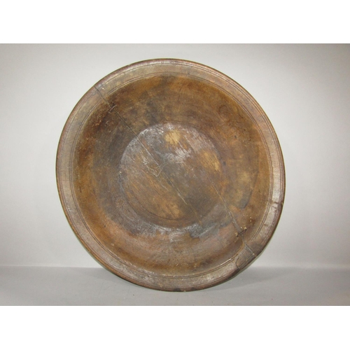 611 - Two Indian rice/grain bowls, both circular, one carrying handles.