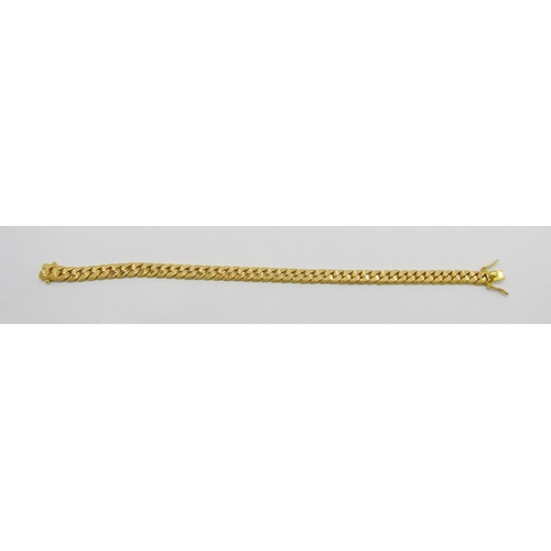 372 - Foreign 22ct curb link bracelet with bright-cut finish, clasp stamped '916', 19.8cm L approx excludi... 