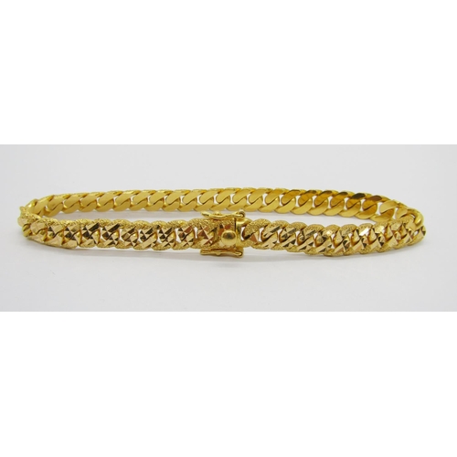 372 - Foreign 22ct curb link bracelet with bright-cut finish, clasp stamped '916', 19.8cm L approx excludi... 