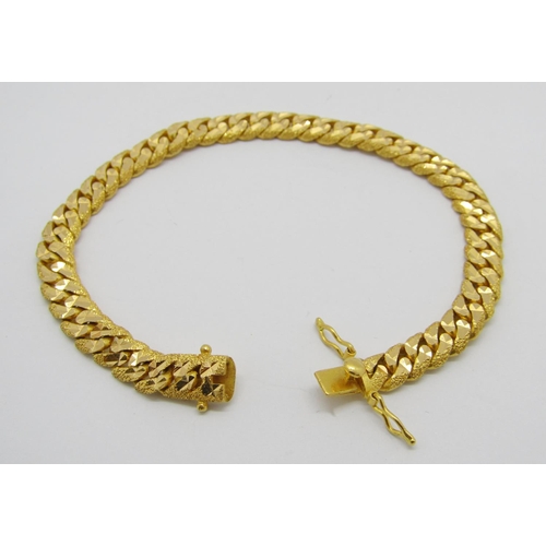 372 - Foreign 22ct curb link bracelet with bright-cut finish, clasp stamped '916', 19.8cm L approx excludi... 