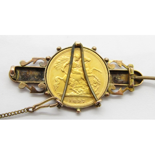 381 - 1897 half sovereign mounted in a decorative 9ct brooch, 4.1cm W approx, 6.8g