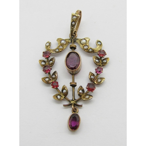 382 - Two Edwardian 9ct pendants; a garnet and seed pearl example with laurel garland frame, maker 'H&W' a... 